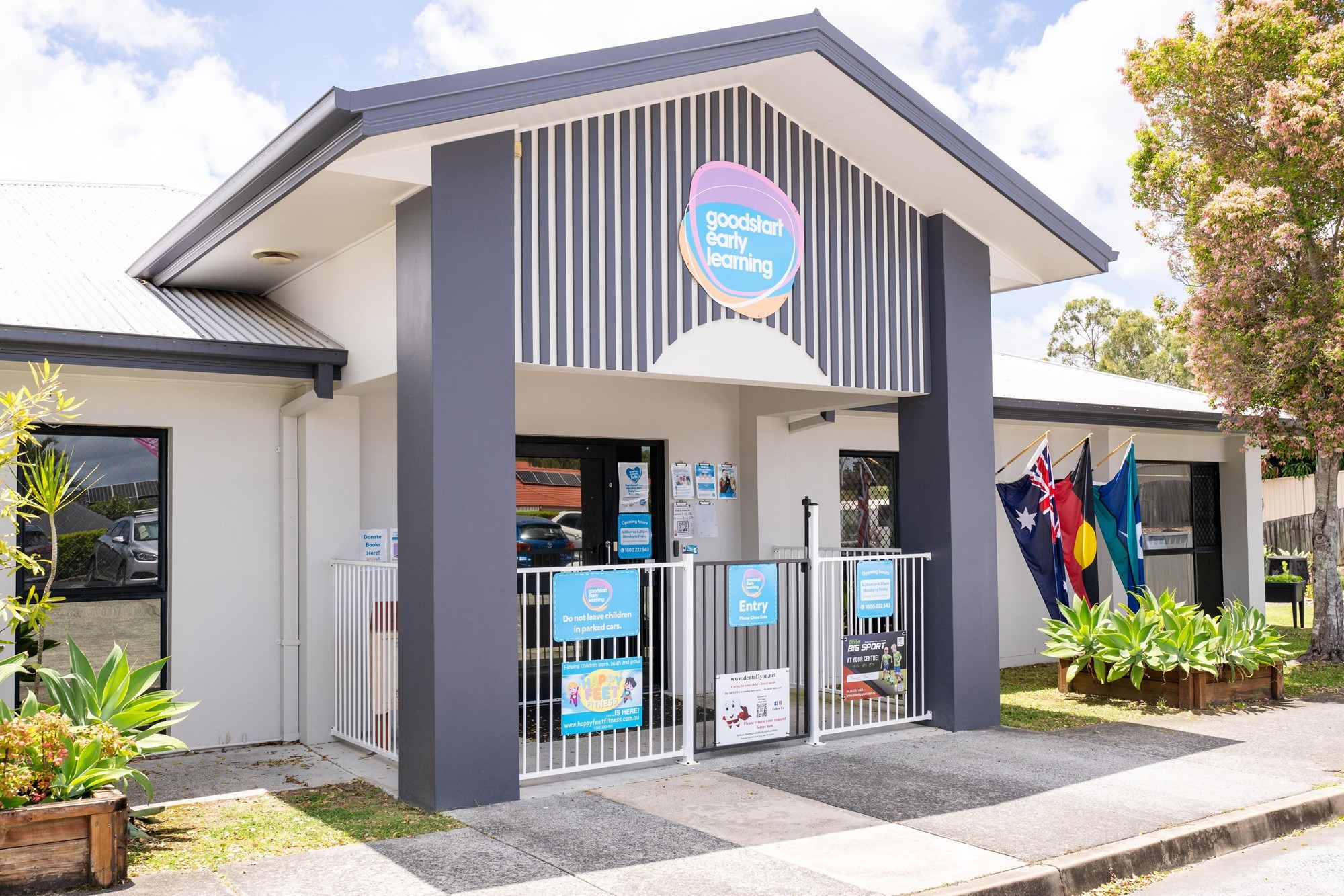 goodstart-gaven-pacific-pines-front-entrance-with-flags-min.jpg