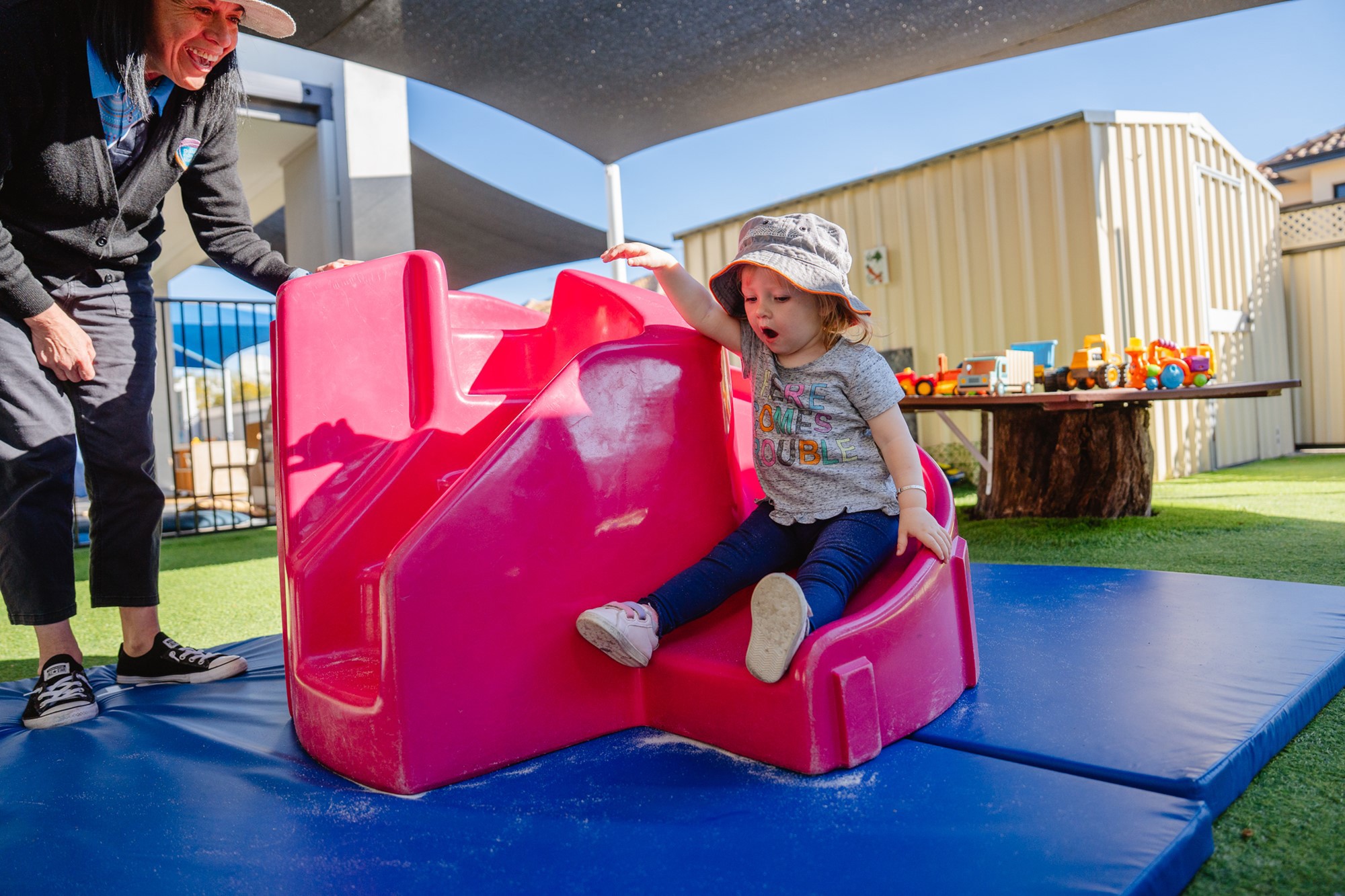 Goodstart-Meadow-Springs-Child-on-slide.jpg